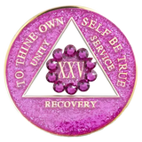 Front of glitter pink AA recovery medallion framed by a pink crystal border