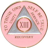 Pink and silver AA recovery medallion for sobriety years 1 through 50
