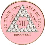 Pink AA recovery medallion with white crystal border for years 1 through 50