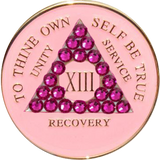 Pink AA recovery medallion with matching pink crystals for years 1 through 50