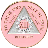 Pink AA recovery medallion framed by a white crystal circle for years 1 through 50