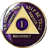 Front of purple and gold AA recovery medallion for sobriety years 1 through 50