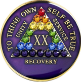Purple AA recovery medallion with rainbow crystals for sobriety years 1 through 65