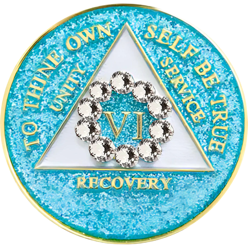 Front of an AA glitter turquoise recovery medallion with a white crystal circle for years 1 through 50