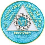 Front of an AA glitter turquoise recovery medallion with a white crystal circle for years 1 through 50