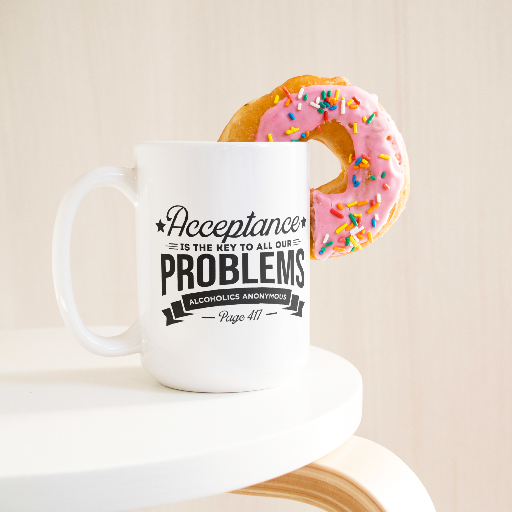 Acceptance_Is_the_Key_Recovery_Coffee_Mu_15ozWhiteMugLifetsyleDonutLH_Mockup.png_15810067