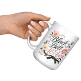 Black_Belt_Al-Anon_Recovery_Coffee_Mug__15ozWhiteMugLifestyleLHRaisedAngle_Mockup.png_15824893
