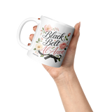 Black_Belt_Al-Anon_Recovery_Coffee_Mug__Lifestyle_Raised_Hand_LH_Mockup.png_15824887