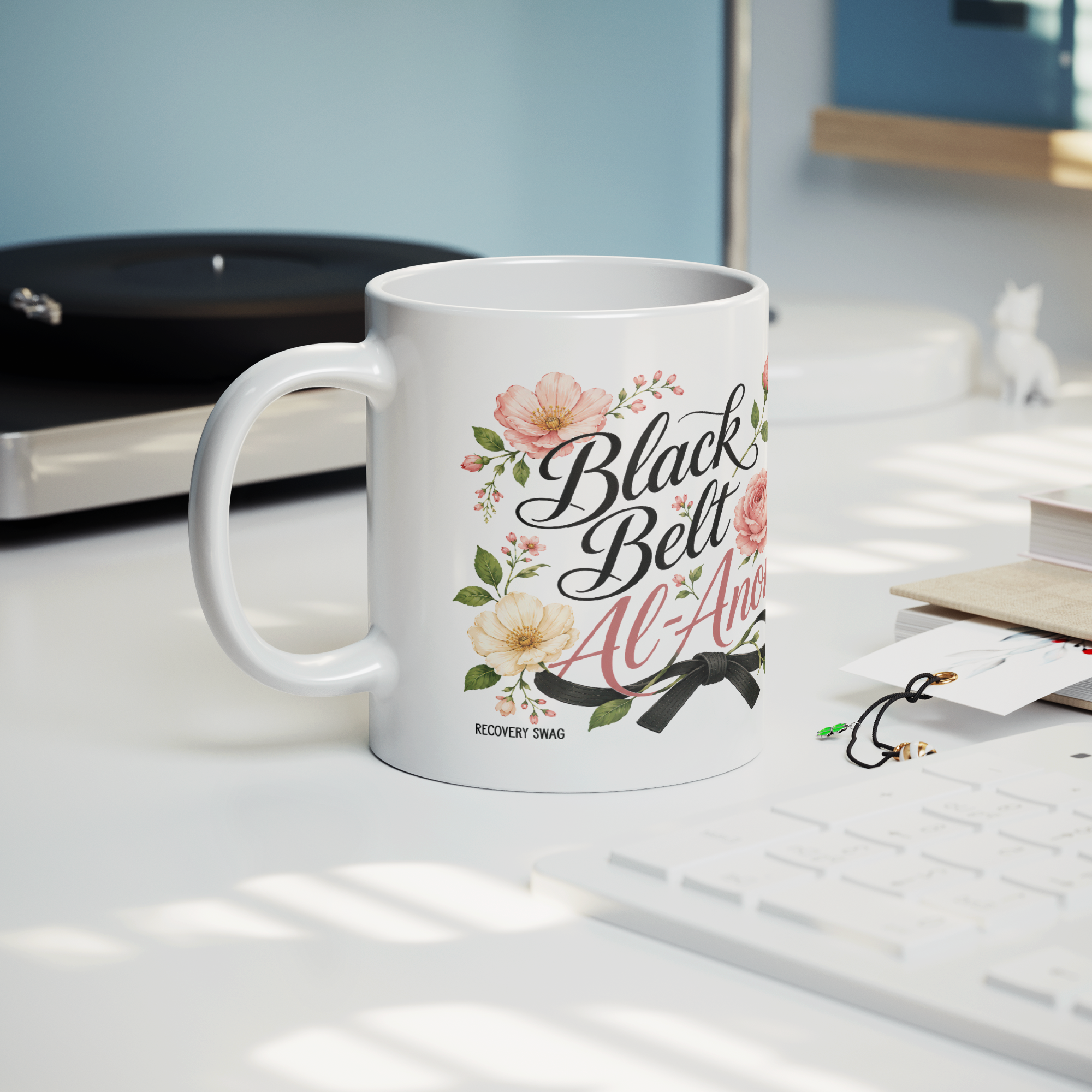 Black_Belt_Al-Anon_Recovery_Coffee_Mug__Lifestyle_Record_Player_Mockup.png_15824888