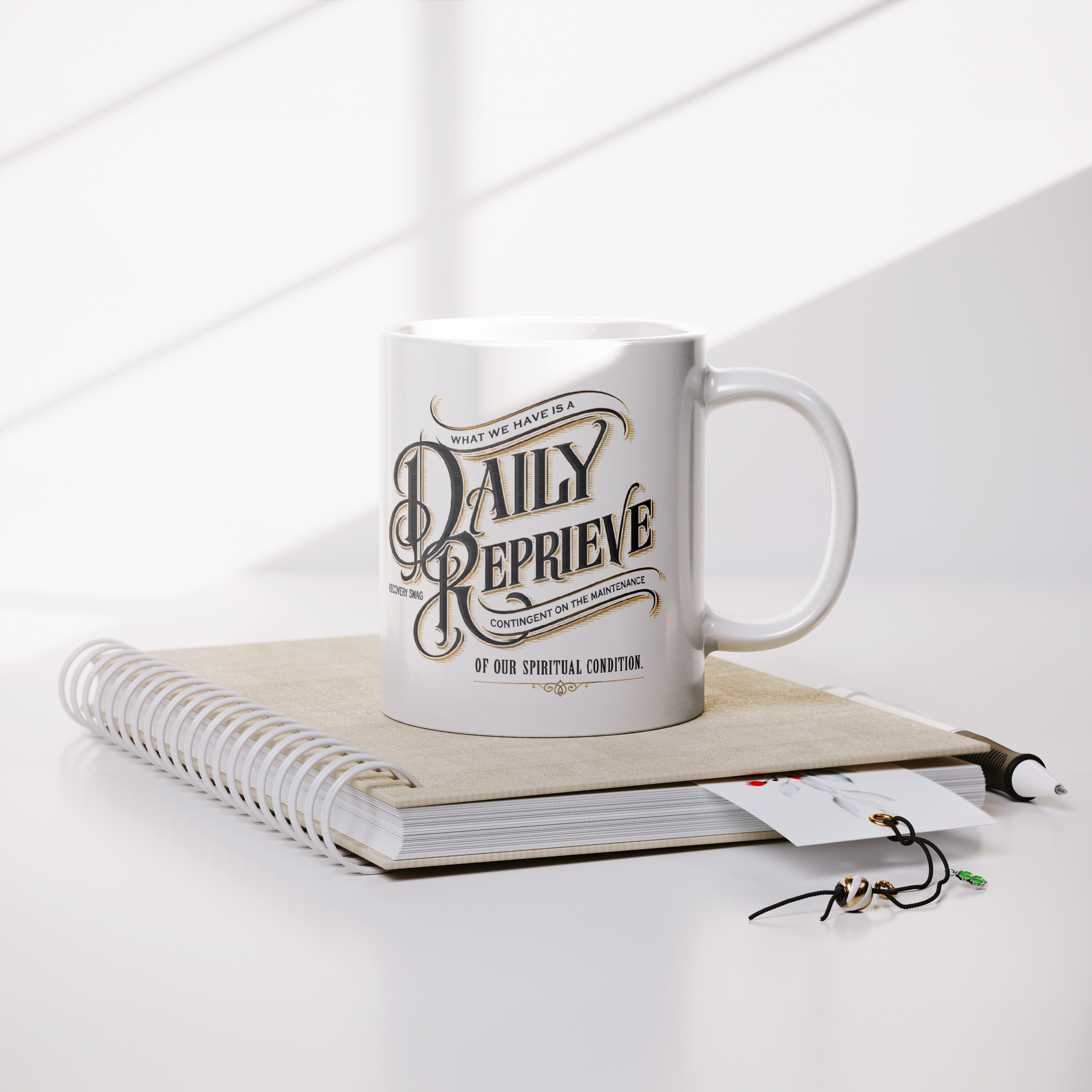 Daily_Reprieve_Recovery_Coffee_Mug__AA__Lifestyle_Notebook_Mockup.png_15824915