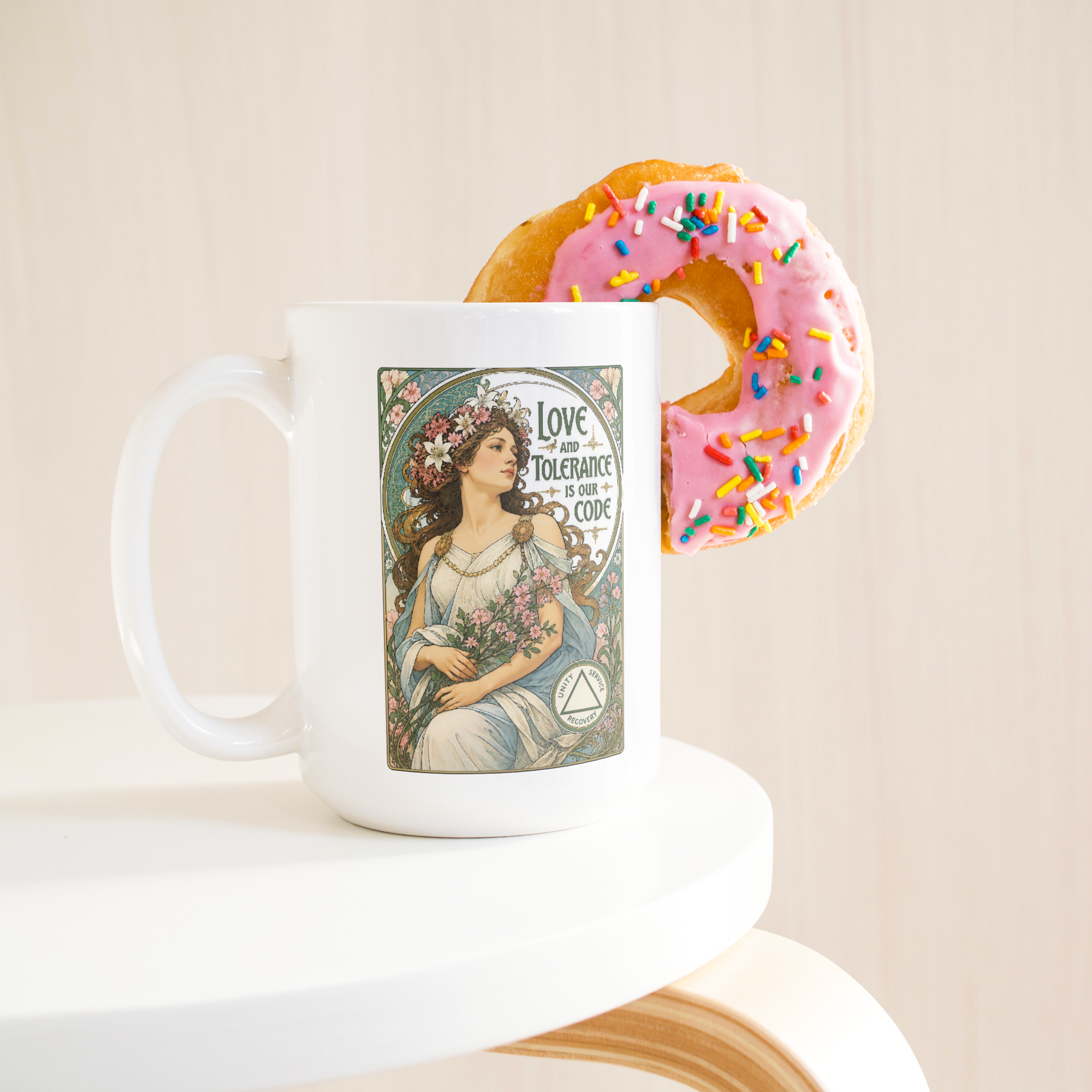 Love_and_Tolerance_Is_Our_Code_Recovery__15ozWhiteMugLifetsyleDonutLH_Mockup.png_15824954