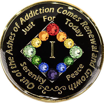 Front of black NA recovery medallion with rainbow Swarovski crystals and gold-plated details