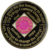 Back of glitter pink NA recovery medallion featuring the Serenity Prayer