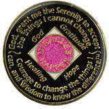 Back of glitter pink NA recovery medallion with pink crystals and Serenity Prayer