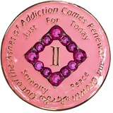 Front of pink NA recovery medallion with pink crystals, available in years 1–45
