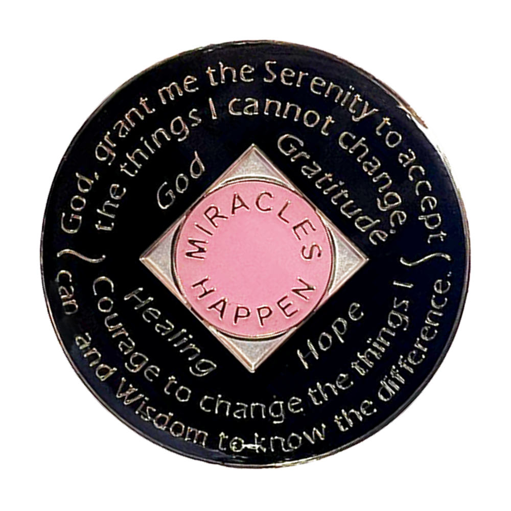 Back of pink NA recovery medallion with rainbow crystals and Serenity Prayer