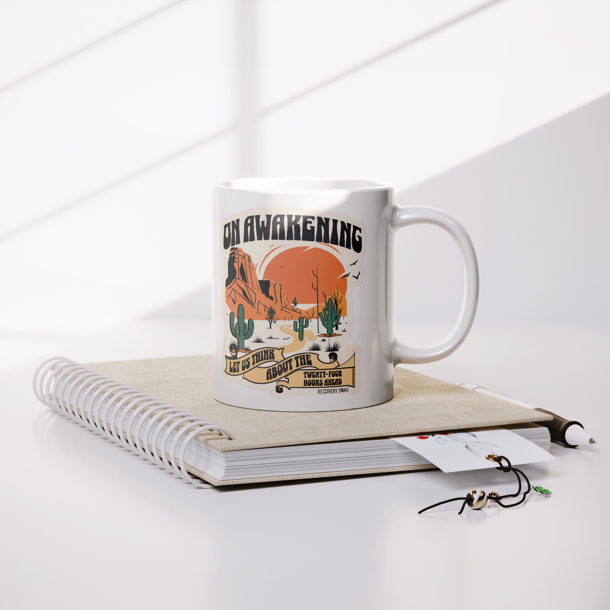 On_Awakening_Recovery_Coffee_Mug__AA_Gi_Lifestyle_Notebook_Mockup.png_15825033