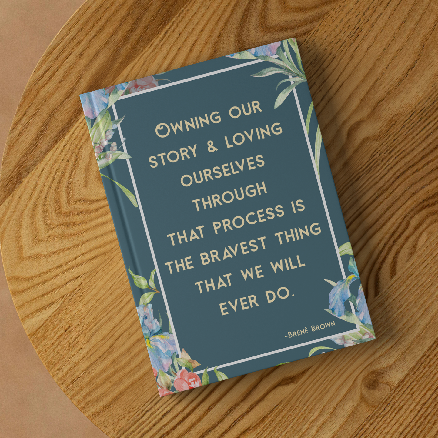 Owning Our Story lined personal growth journal in a lifestyle setting