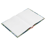 Owning Our Story journal open to blank pages at an angle