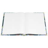 Owning Our Story journal open to blank pages flat view
