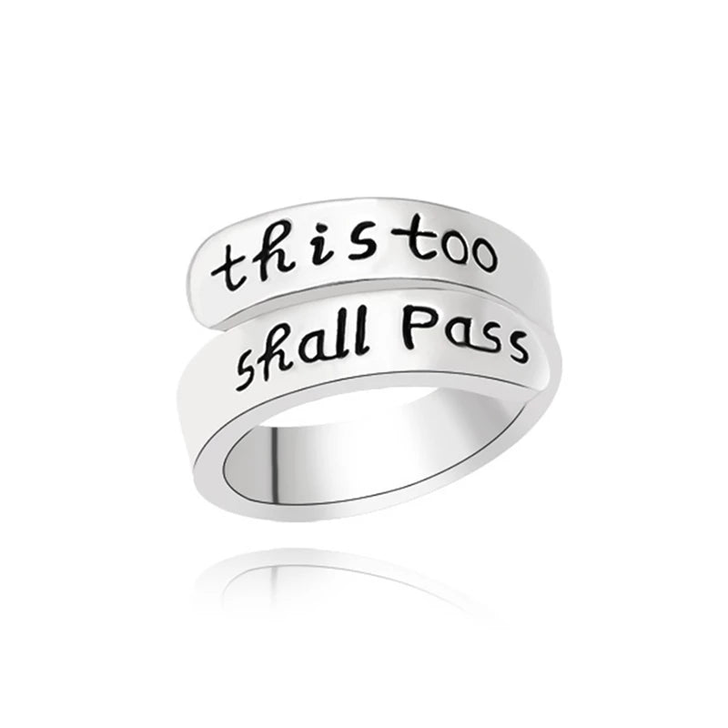 sterling silver ring with the inscription 